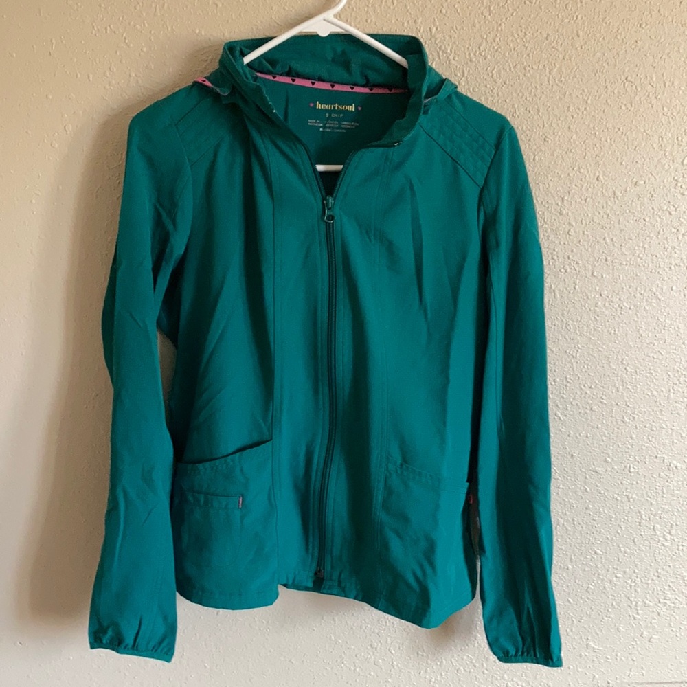 Woman’s small scrub jacket by Heartsoul in hunter green